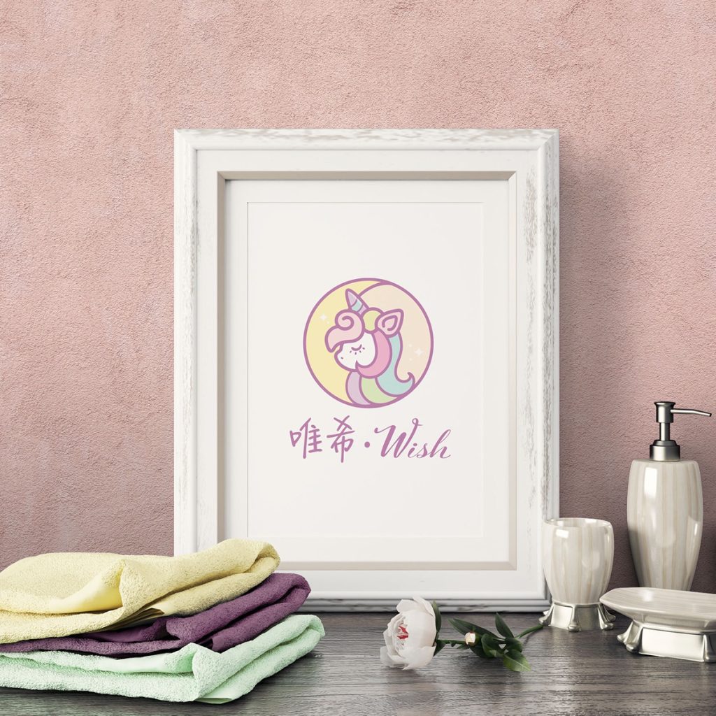 白色相框內展示獨角獸插畫 Logo，結合粉色圓框與星星點綴，下方文字為『唯希・Wish』，整體風格柔和夢幻，營造童話般的療癒感。
